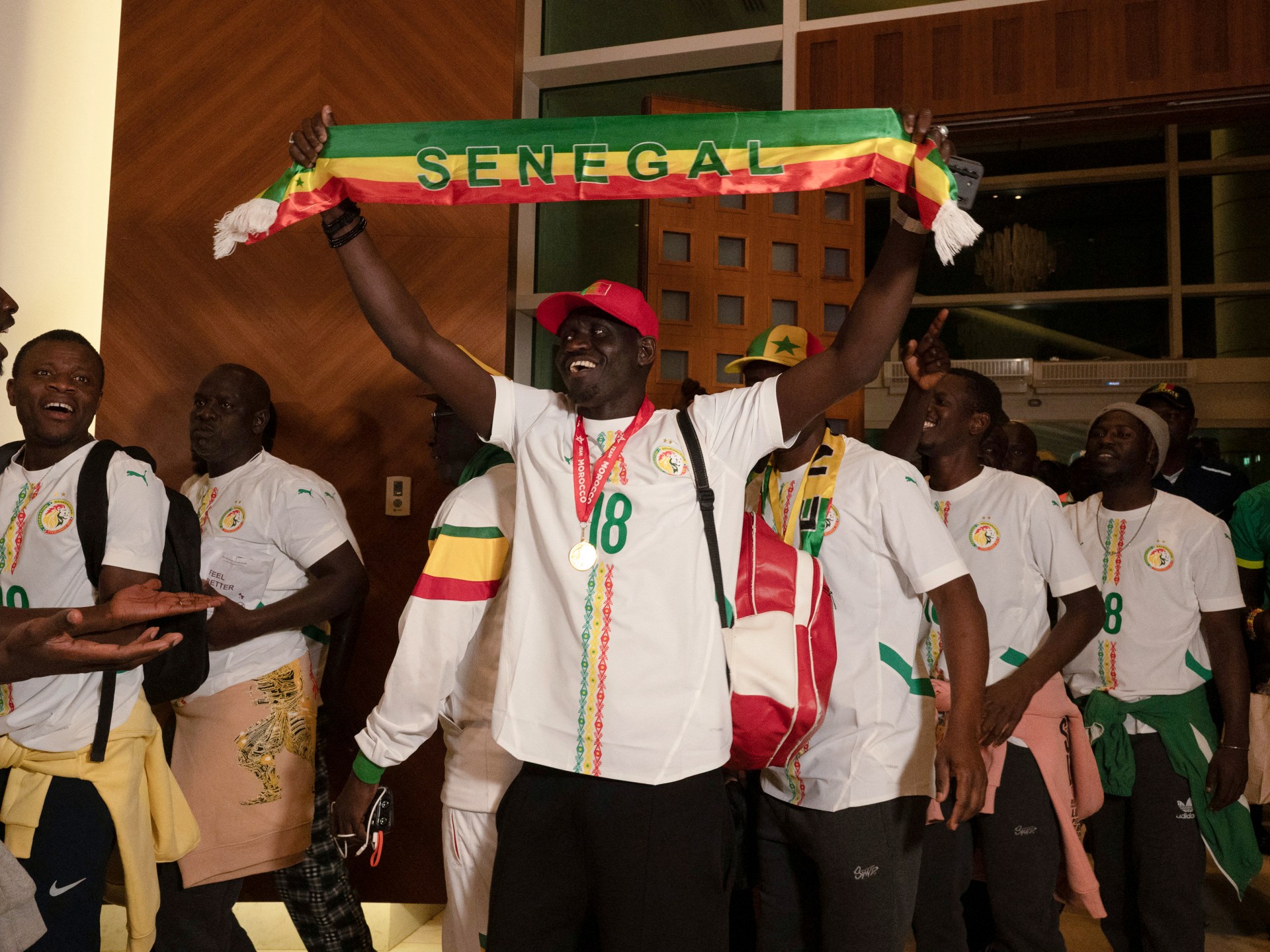 Penggemar sepak bola Senegal kembali ke rumah setelah memaafkan kerajaan di Maroko